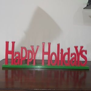 Wooden letters. “Happy Holidays”.